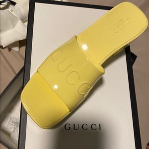 Women’s Gucci rubber slides